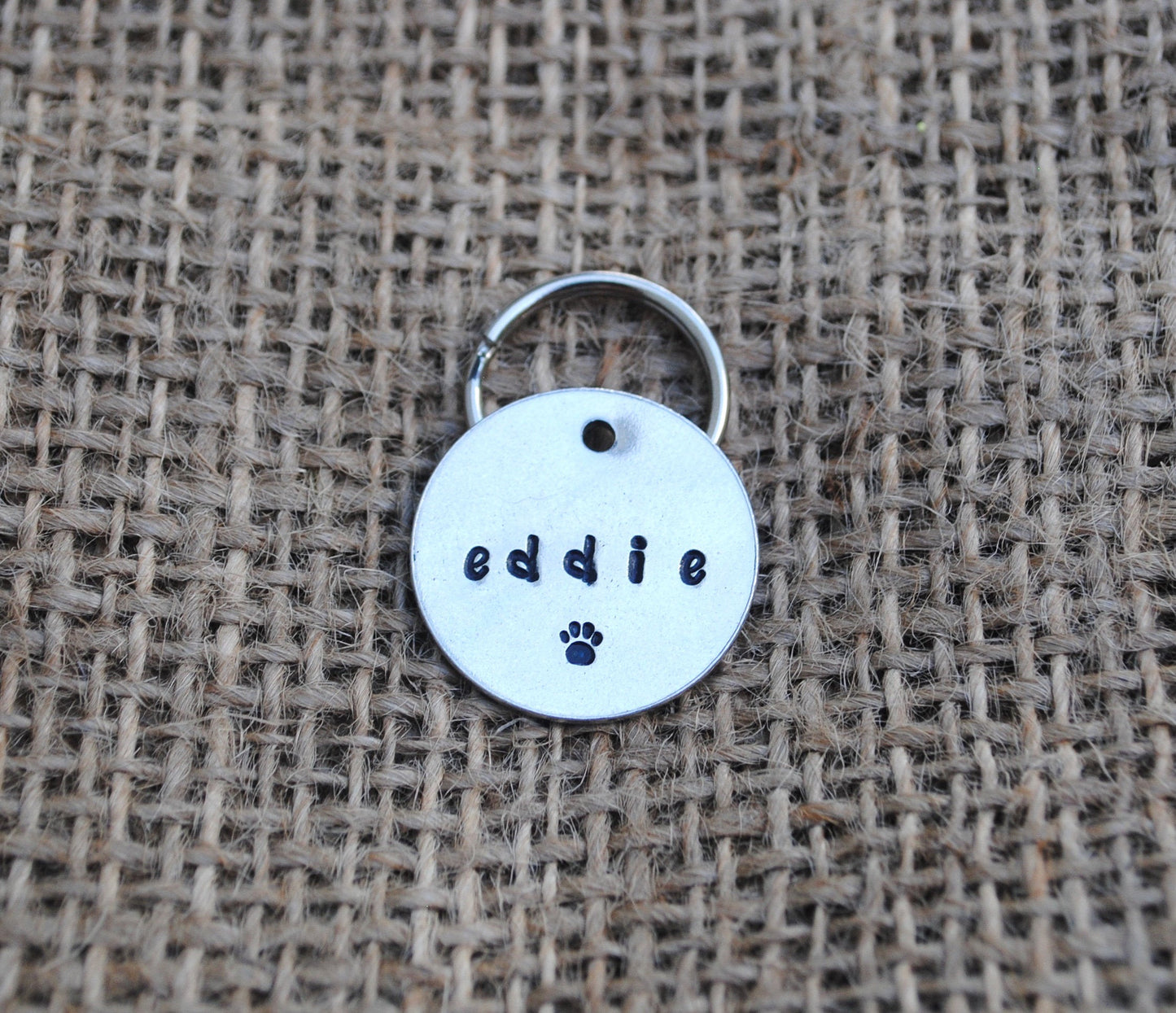 Paw Print Personalized Dog Tag - Cat ID Tag - Dog Collar Tag - Custom Dog Tag - Personalized Tag - Pet ID Tag - Pet Name Tag - Customized Dog Tag - Customized Cat Tag - Minimalist - Pet name on front with a paw print design. Your phone number will be on the back.